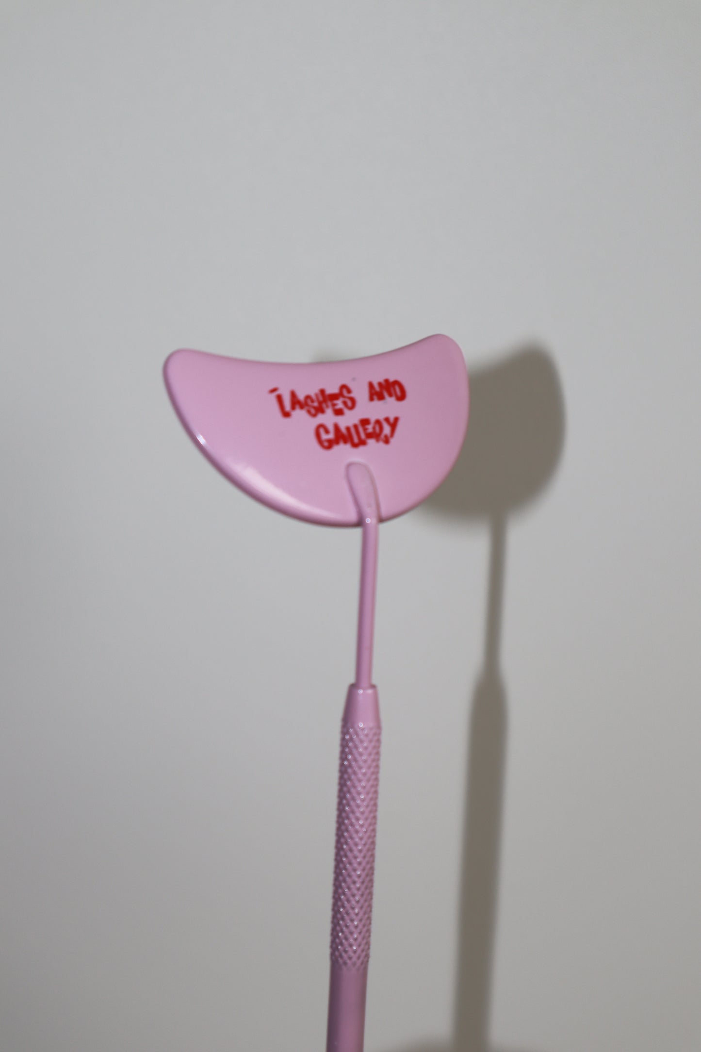 Half moon lash mirror